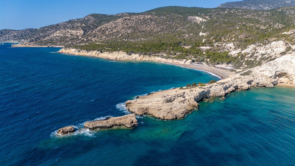 Monolithos Beach Santorini wide sandy beach with shallow waters perfect for children